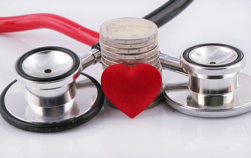 a stethoscope with a red heart on top of it