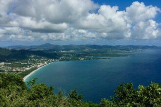 aerial view of sea under cloudy sky during daytime