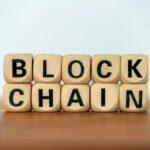 Close up word blockchain on wooden block