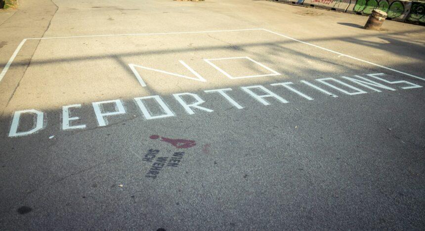 Deportation written on sidewalk