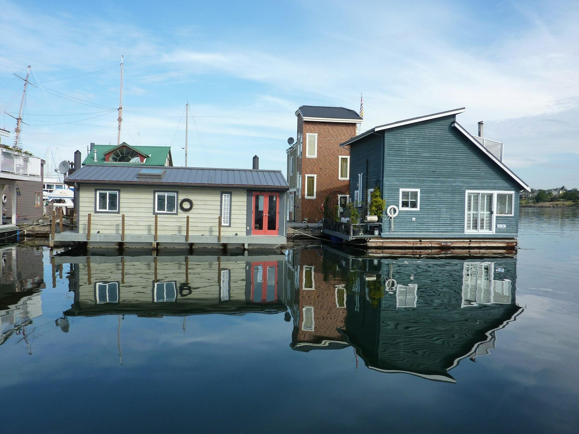 Colorful and cute houses and their reflections in the water