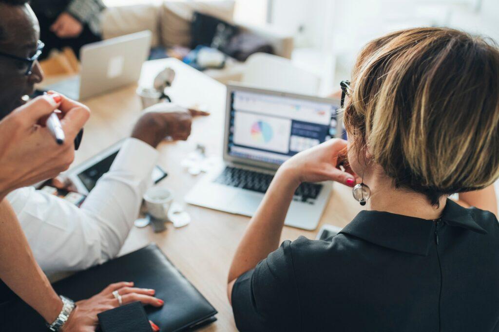 Businessmen and businesswomen having discussion in loft office