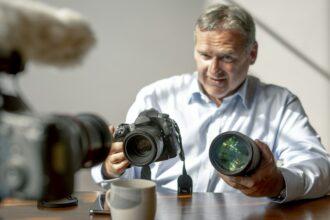 Old photographer with his camera