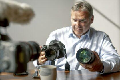 Old photographer with his camera