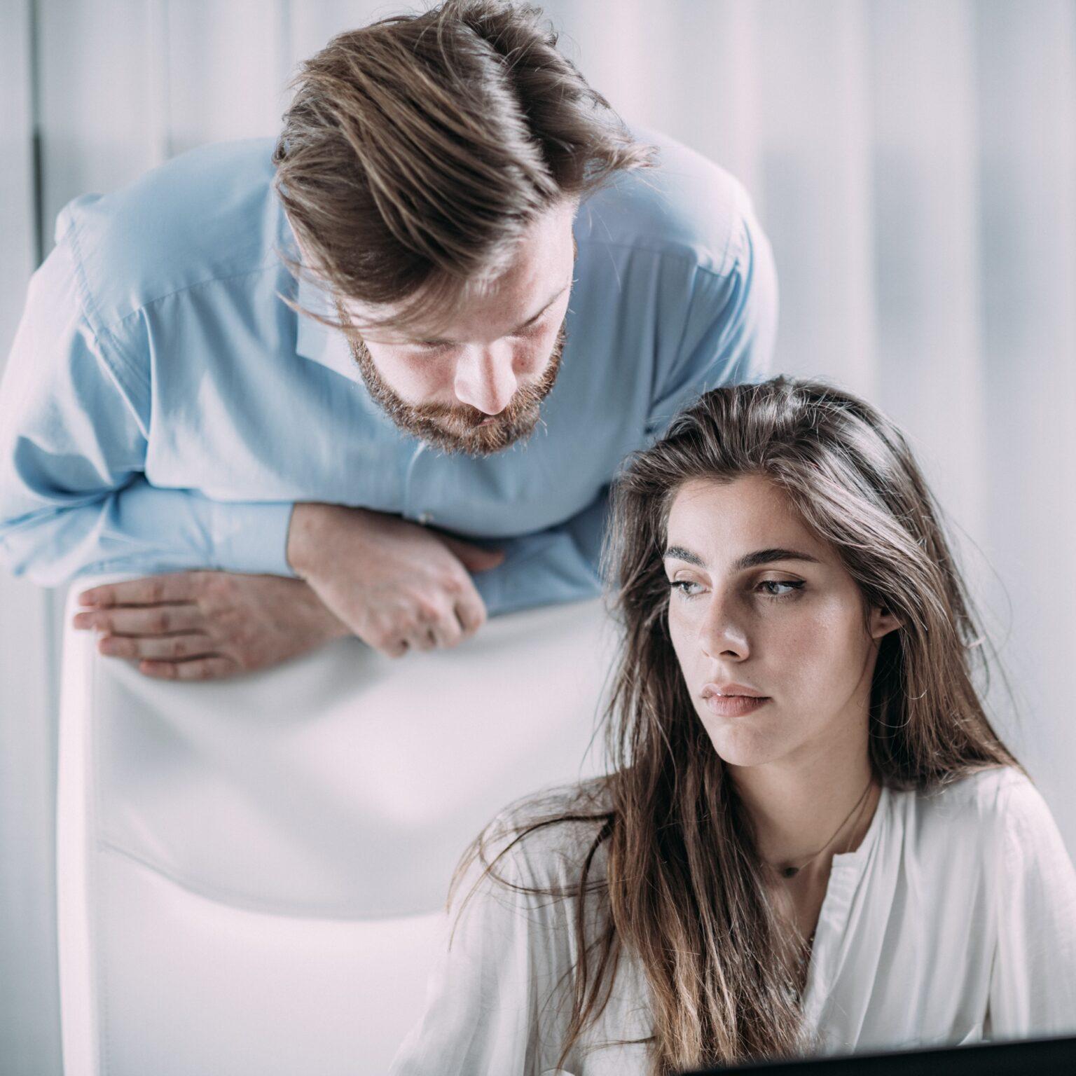 Pressure at Work. Boss Pressures New Female Worker.