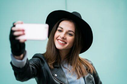 Young girl taking a selfie.