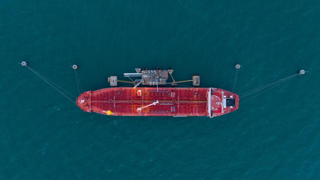 Oil tanker ship. Red Oil Tanker runing in the ocean sea. petroleum ship transportation import