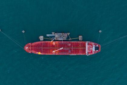 Oil tanker ship. Red Oil Tanker runing in the ocean sea. petroleum ship transportation import