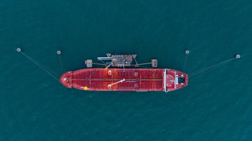 Oil tanker ship. Red Oil Tanker runing in the ocean sea. petroleum ship transportation import