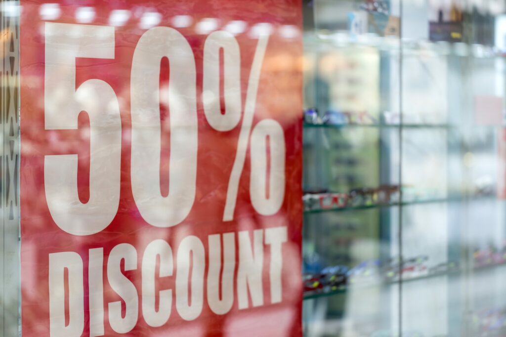 Window shopping. 50% discount, sale, special offer. Special deal, attention to the discount.