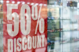 Window shopping. 50% discount, sale, special offer. Special deal, attention to the discount.