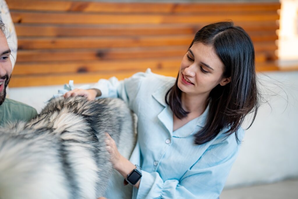 young women play with her dog live for tiktok.